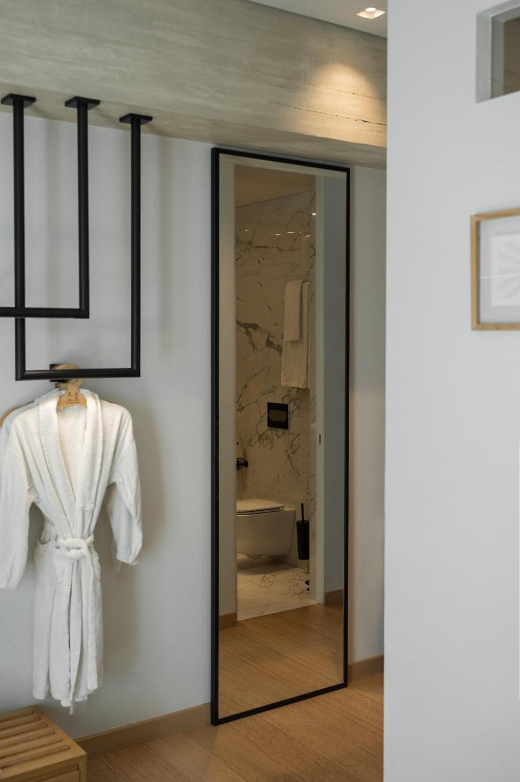 Coco-Mat Athens Jumelle Hotel ภายนอก รูปภาพ A bathrobe hanging on a hanger
