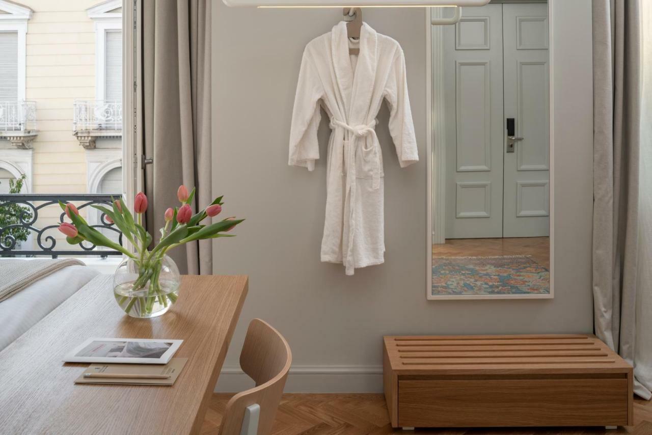 Coco-Mat Athens Jumelle Hotel ภายนอก รูปภาพ A bathrobe hanging on a wall